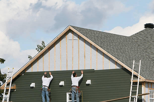 Professional Siding technician working in Newtown, OH